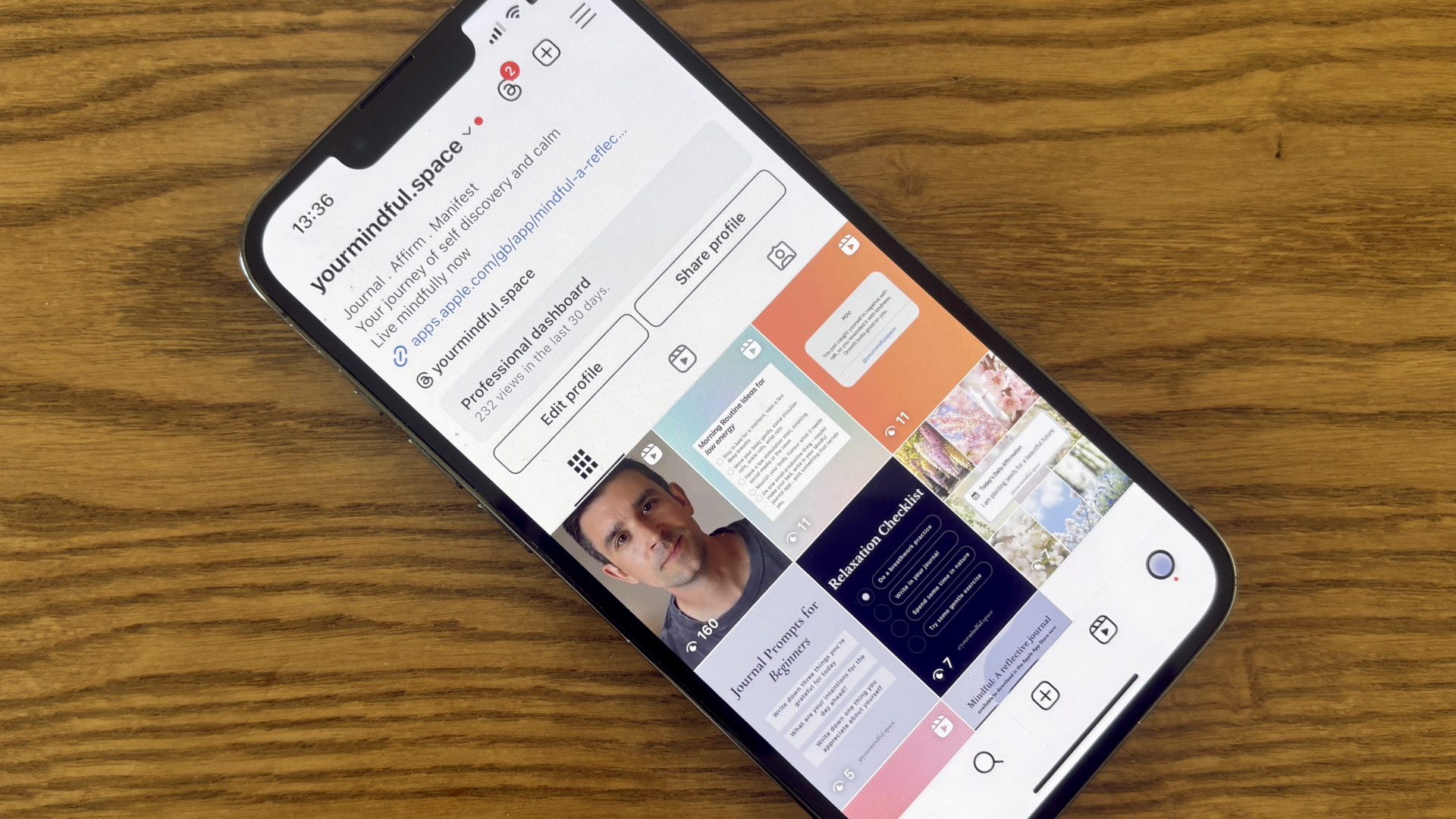 An iPhone displaying a social media app home feed with notifications